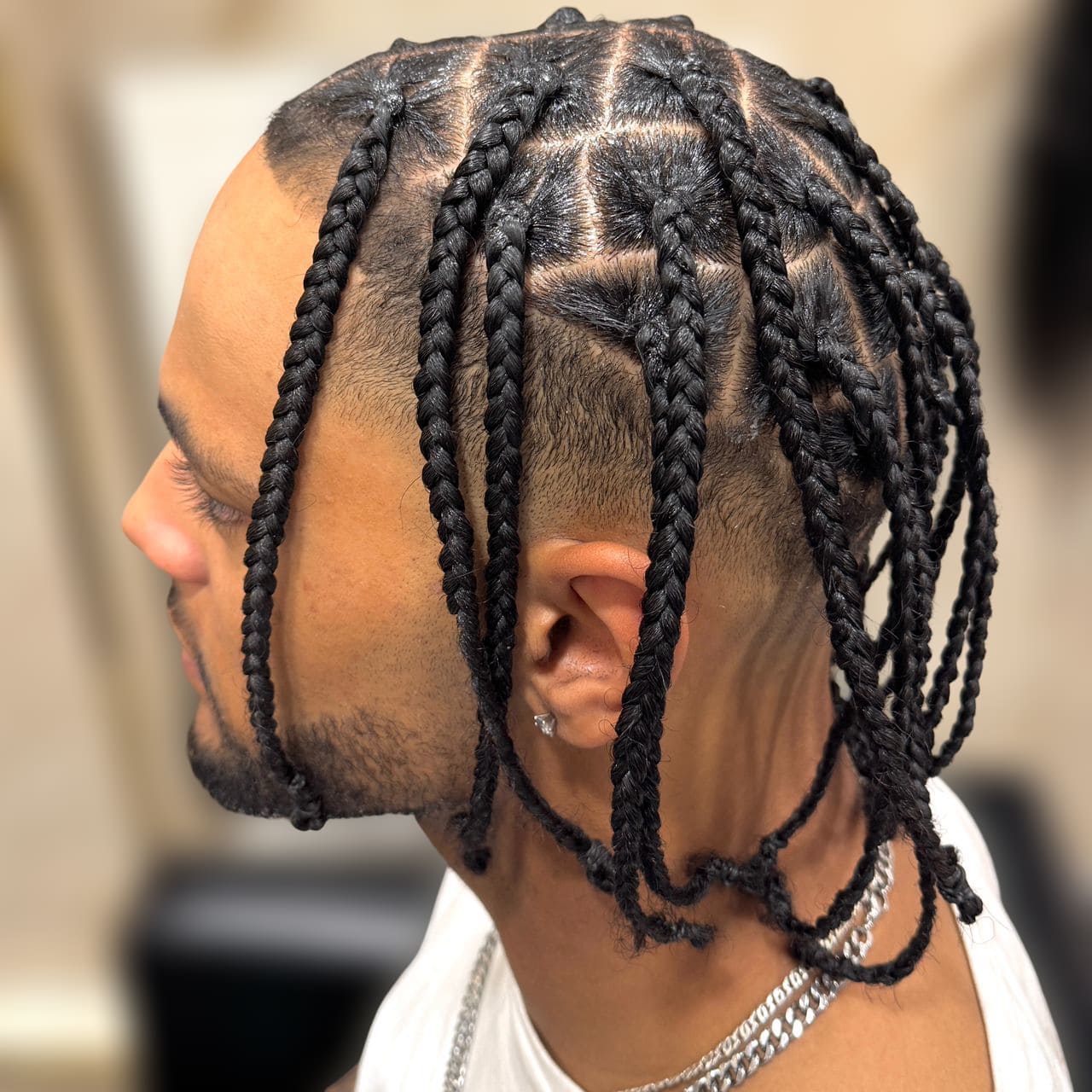 Cornrows mit sauberem Curve-Pattern von oben – gestylt im Afro American Barbershop Nürnberg